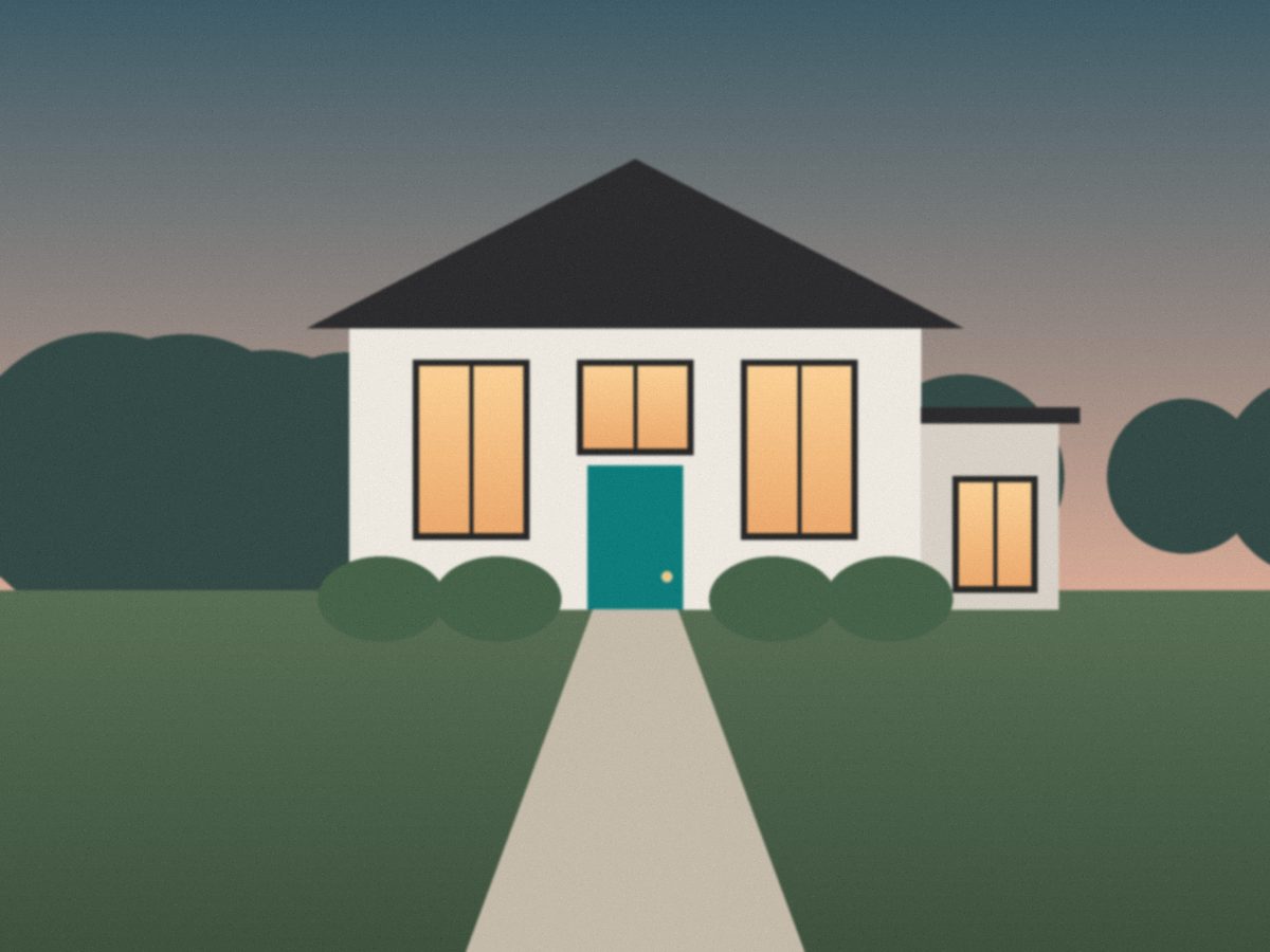 A modest two-storey house with tall windows and a garden path at dusk
